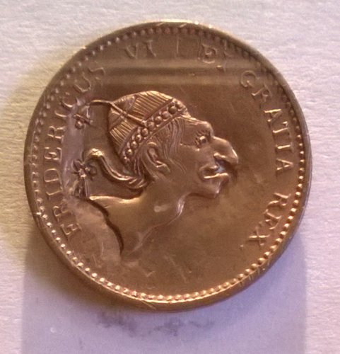 Denne smædemønt fra 1813 viser Frederik 6. med jødiske træk